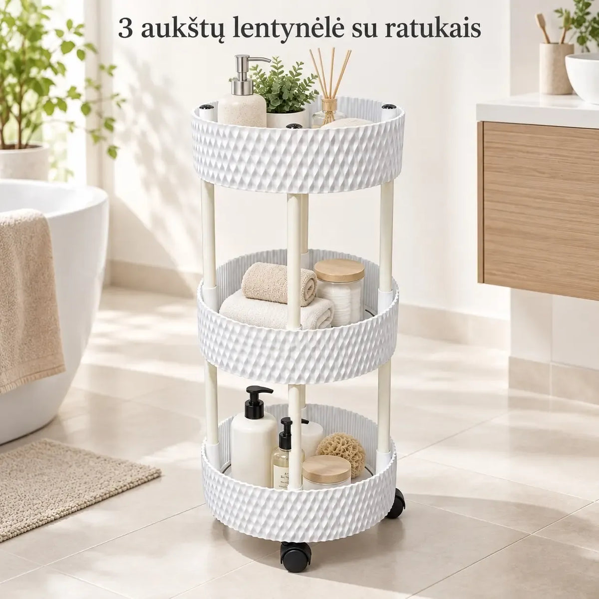 Trijų aukštų plastikinė lentyna su ratukais, skirta organizuoti ir laikyti daiktus namuose ar biure.