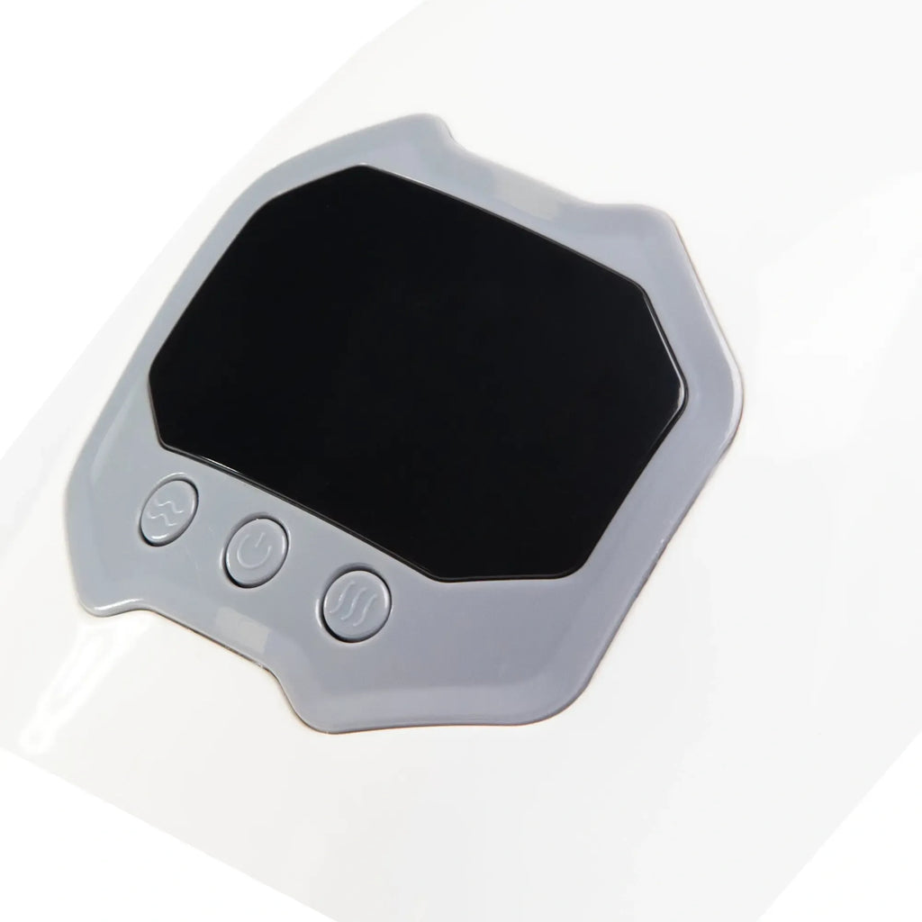 Belaidis masažuoklis juodos spalvos ant balto fono