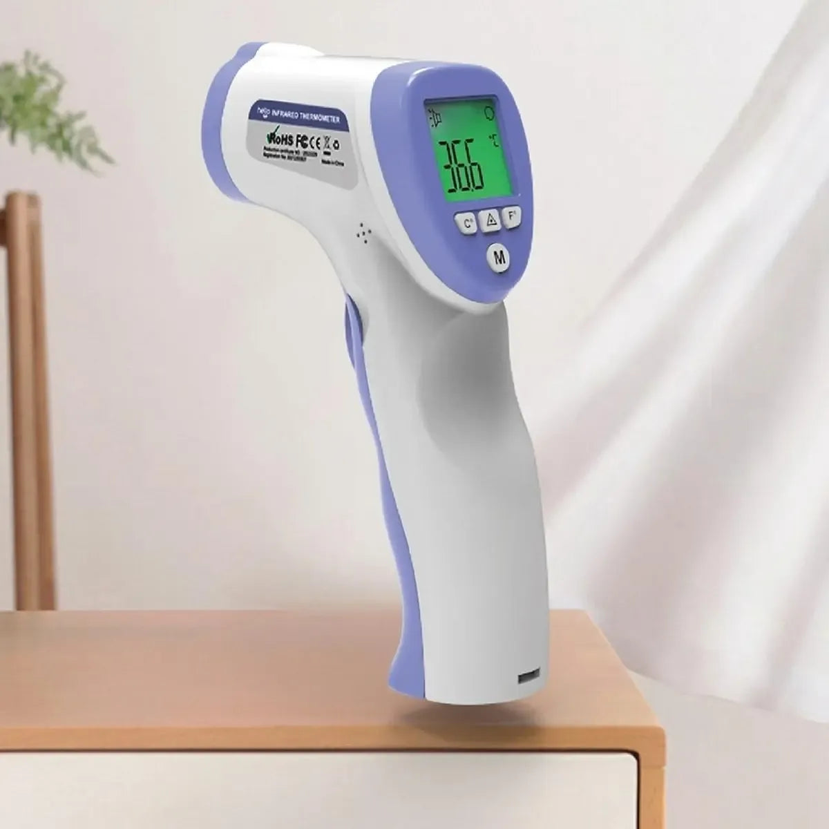 Elektroninis bekontaktis infraraudonųjų spindulių termometras matuoja kūno temperatūrą be kontakto, rodo skaitmeninius temperatūros duomenis.