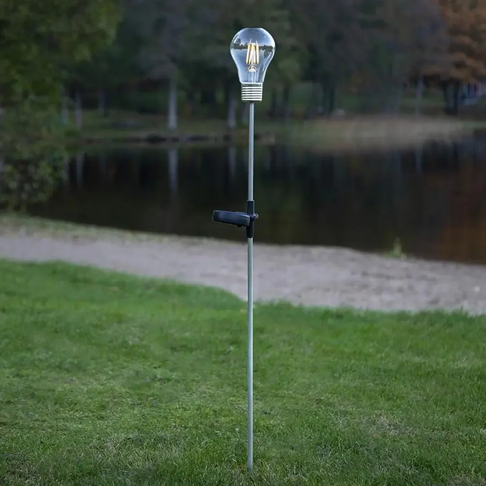 Lauko LED Edison lemputė su saulės baterija, 80 cm ilgio, vintage stiliaus dekoratyvinė šviesa, skirta lauko apšvietimui.