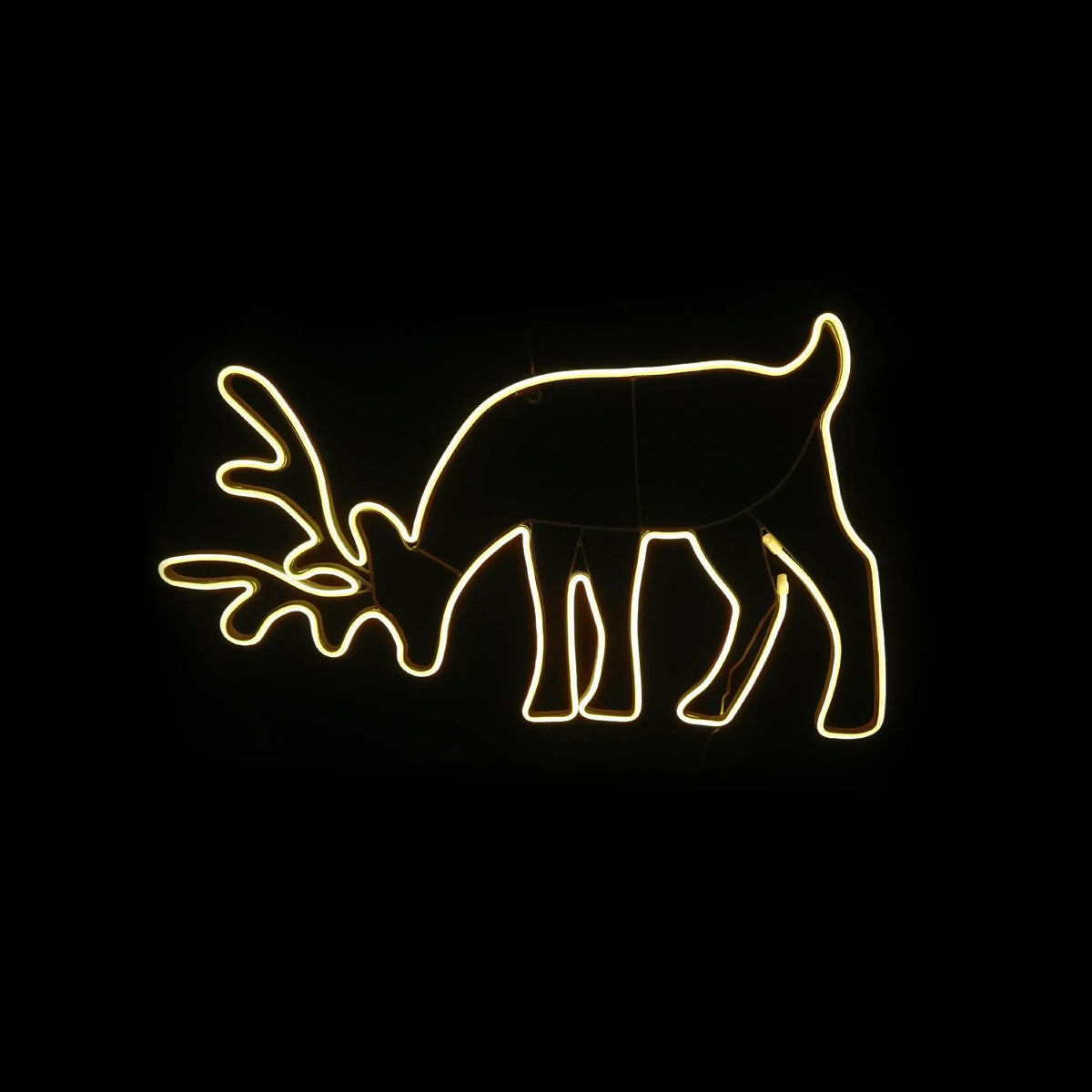 Šviečiantis LED neoninis elnias šventiniam interjerui, ryškus ir spalvingas dekoratyvinis elementas namuose.