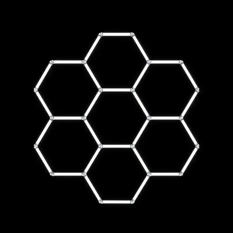 Modulinis lubinis LED šviestuvas Hexagon su geometriniu dizainu, baltos spalvos, modernus apšvietimo sprendimas.