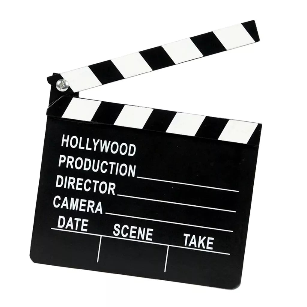 Filmavimo pliauskė Movie Clap Hollywood, plastikinė, juoda, su rankena ir garsiniu mygtuku, naudojama filmavimui ir vaizdo įrašams.