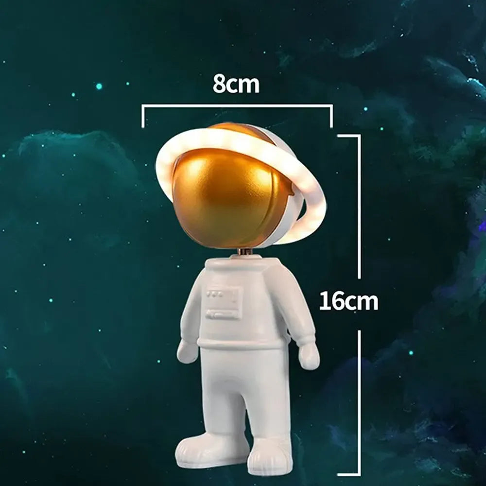 Įkraunamas LED naktinis projektorius su astronautu, su šviečiančiais žvaigždžių ir planetų vaizdais vaikų kambariui.