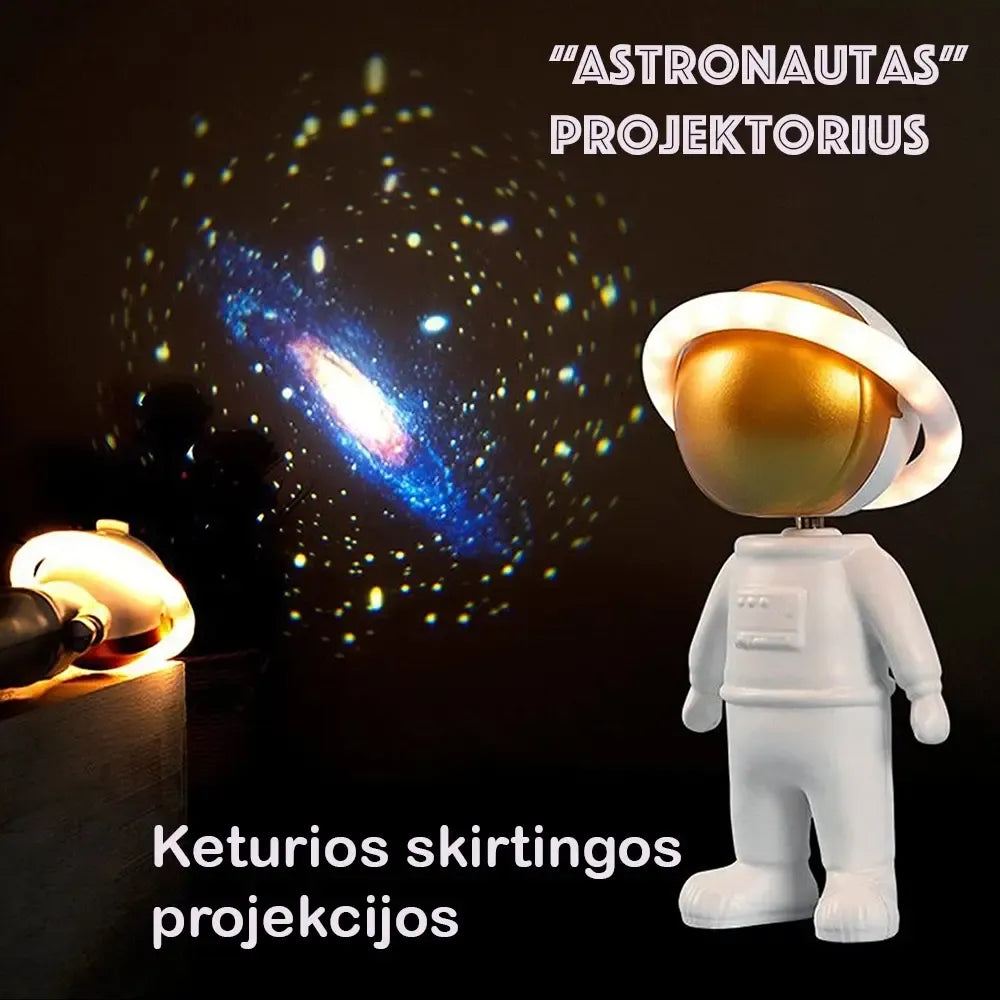 Įkraunamas LED naktinis projektorius su astronautų motyvu, šviečia spalvingomis šviesomis vaikų kambaryje.