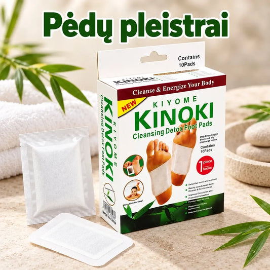 Pėdų pleistrai su aukso folija Kinori, 10 vnt, matomas dėklas ir pleistrai su aukso lapeliais ant pėdų odos.