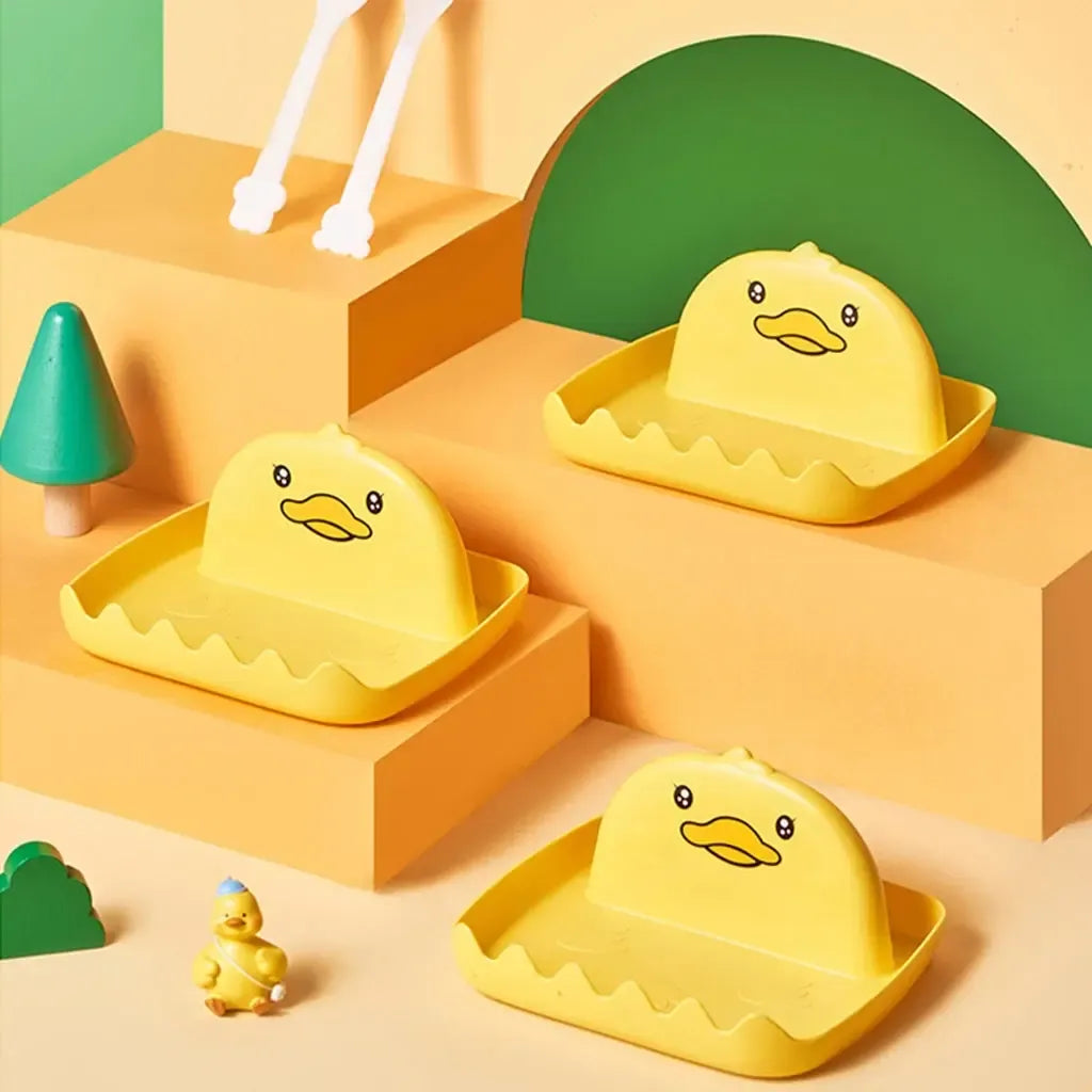 Plastikinis universalus virtuvės įrankių laikiklis Duck, tvirtas ir patogus, skirtas saugiai laikyti virtuvės įrankius.