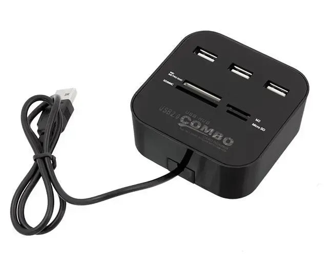 USB šakotuvas su kortelių skaitytuvu, universalus 3 prievadų HUB, matomas kompiuterio šalia su prijungtais kabeliais.