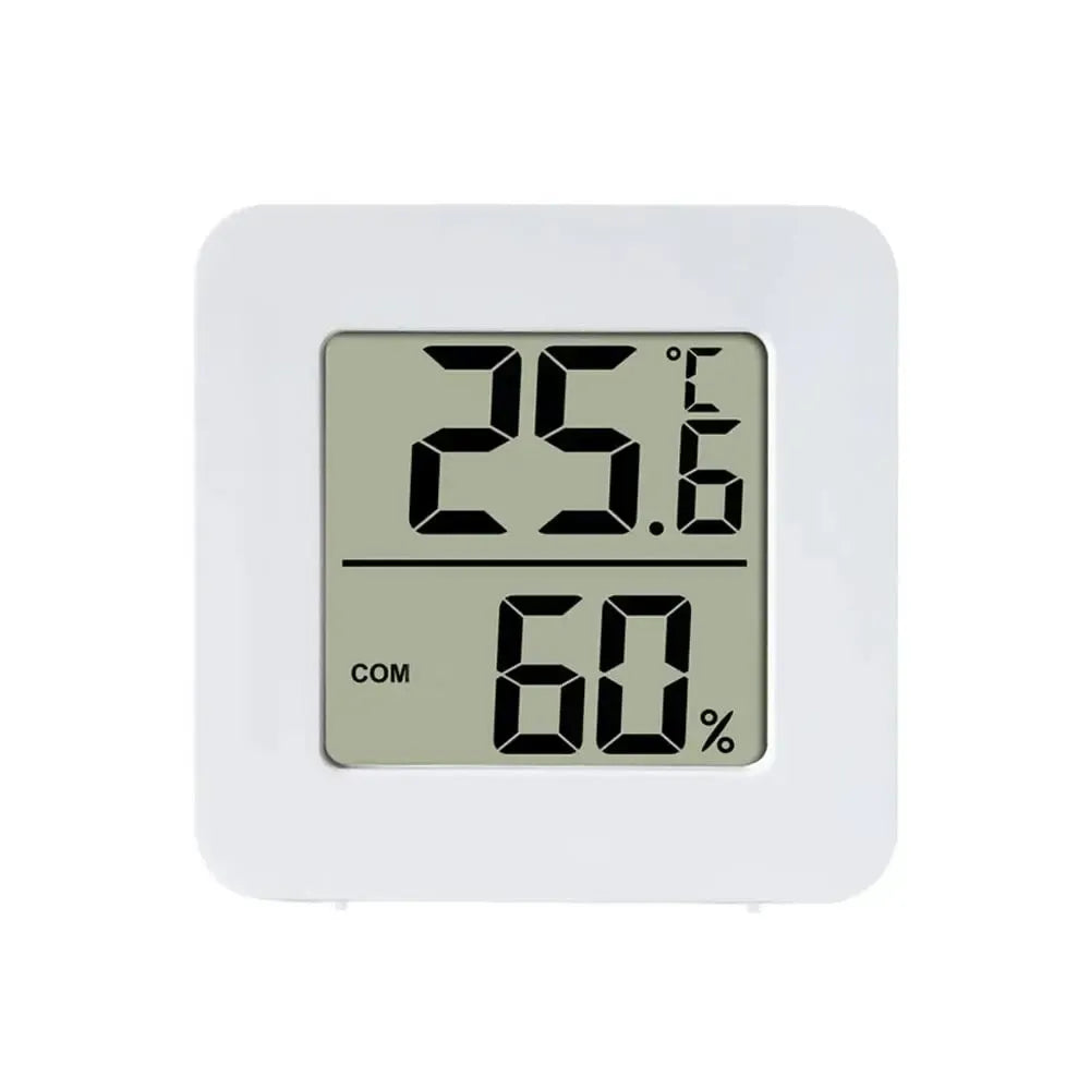 Vidaus termometras-higrometras TR1668 matuoja oro temperatūrą ir drėgmę, su aiškiu skaitmeniniu ekranų rodymu.